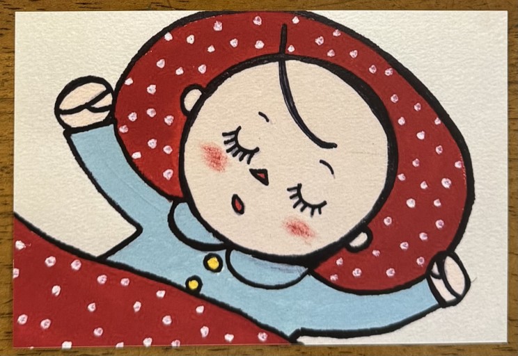 ポストカード「Sleeping on a red polka dot pillow」